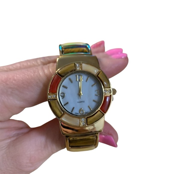 Avon Accessories - Avon semi-precious round face cuff watch goldtone NIB